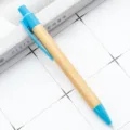 Bamboo ballpoint pen with blue click mechanism and natural wood grain finish for daily office writing. - Blue