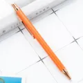 Orange metal ballpoint pen with rose gold clip, smooth click writing instrument for office. - Orange
