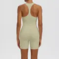 Back view detail of solid color athletic yoga tank top and shorts set for fitness workout. - S / Top And Bottom / Khaki