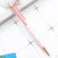 Pink four-leaf clover crystal ballpoint pen with rose gold trim and floating glitter. - Macaron Light Pink