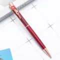 Elegant red glitter ballpoint pen with rose flower top decoration for office and school. - Burgundy