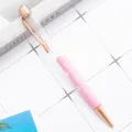Stylo à bille élégant en métal or rose avec motif floral rose et corps transparent pour cadeau. - Rose bonbon mat (éléments or rose)