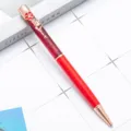 Red glitter quicksand ballpoint pen with floral clip, stylish liquid metal writing pen. - Red