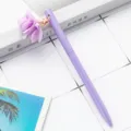 Purple metal ballpoint pen with cute fabric flower pendant charm for student stationery use. - Candy Purple