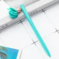 Turquoise metal ballpoint pen with cute fabric flower pendant aesthetic stationery supply. - Candy Blue