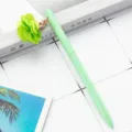 Light green metal ballpoint pen with cute fabric flower pendant student stationery cute style - Candy Green