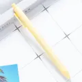 Yellow retractable ballpoint pen, smooth writing plastic student stationery supply. - Creamy Yellow