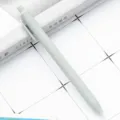 Minimalist retractable ballpoint pen in light green, smooth writing stationery for students. - Light Gray