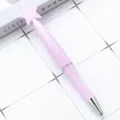 Penna a sfera rosa con stella e design rotante, cancelleria in plastica carina per ufficio. - Punta a Proiettile 1,0 mm / Rosa Caramella
