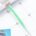 Green crystal bow ballpoint pen with glitter finish, elegant metal design for writing. - White Green Gradient
