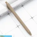 Minimalist retractable ballpoint pen in khaki, smooth plastic matte finish student stationery. - Light Coffee