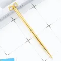 Gold crystal bow ballpoint pen, elegant metal design with sparkling diamond top for writing. - Electroplated Gold