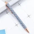 Metal ballpoint pen with rose gold trim and glitter mermaid scale pattern for office and school. - Scale Pattern Blue