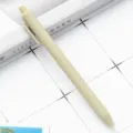 Beige retractable ballpoint pen, minimalist matte plastic design for smooth daily writing. - Bean Green