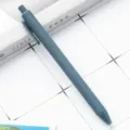 Blue retractable ballpoint pen, soft-touch matte plastic stationery for office and school. - Ink Blue