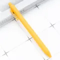 Yellow retractable ballpoint pen with smooth writing experience for students and office use. - Mustard Yellow