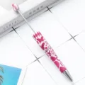 DIY beaded ballpoint pen with custom pink floral pattern and metal tip, elegant stationery. - Pink Floral Butterfly Style