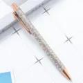 Retractable metal ballpoint pen with glitter green scaly barrel and rose gold trim. - Scale Pattern Light Green