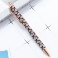Elegant rose gold ballpoint pen with glitter fishscale pattern, smooth click writing for office. - Scale Pattern Black