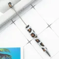 DIY leopard print beaded ballpoint pen, stylish animal pattern metal rotating pen variant. - Leopard Print Style