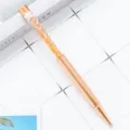 Rose gold crystal ballpoint pen with sparkling glitter sand and elegant flower clip design. - Rose Gold