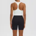 Back view detail of white racerback sports bra and black yoga shorts fitness athletic set. - S / Top And Bottom / White with Black Trim and Black Shorts