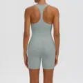 Back view of a solid color double-faced nylon sports bra and tight shorts yoga set for fitness. - S / Top And Bottom / Rhino Grey