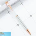 Elegant crystal ballpoint pen with rose gold flower clip and sparkling diamonds inside. - Painted Silver