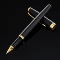 Metal business rollerball pen with sleek black body and gold trim for office and gift use. - Black Yarn (Gold Hardware)