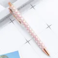 Rose gold retractable ballpoint pen featuring pink glitter sequin wrap, stylish office gift. - Purple & Yellow Checkerboard