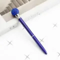 Blue crystal ballpoint pen with sparkling rhinestones and smooth rotating core mechanism. - Transparent Blue