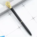 Elegance black metal ballpoint pen with luxurious gold crown top, ideal gift for office. - Black with Gold Parts
