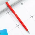 Red metal ballpoint pen sleek corporate gift writing instrument with silver clip. - Red