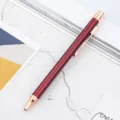 Elegant metal ballpoint pen with metallic red finish and rose gold clip for business use. - Burgundy