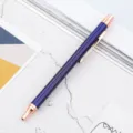 Retractable metal ballpoint pen in dark blue with elegant rose gold trim for office use. - Transparent Blue