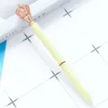 Metal crown ballpoint pen with pastel green body and rose gold crown cap for gift or office. - Candy Yellow (Rose Gold Hardware)