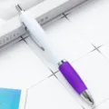 White and purple retractable ballpoint pen with comfortable grip for office and school use. - Purple (White Barrel)