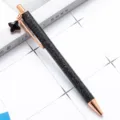 Black glitter metal ballpoint pen with rose gold trim and a cute clover pendant charm. - Black