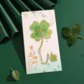 Classical Chinese style hollow metal four-leaf clover bookmark with delicate leaf vein design. - Lucky Four-Leaf Clover (Simple Packaging)