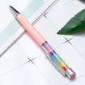 Elegant pink metal ballpoint pen filled with colorful sparkling crystal stones for writing. - Pink