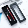 Elegant red metal ballpoint pen and mini flashlight gift set with black window box. - Burgundy