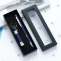 Business gift set featuring a blue stylus ballpoint pen and mini flashlight keychain box. - Dark Blue