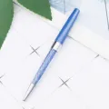 Blue crystal ballpoint pen with sparkling glitter body, elegant office and school stationery item. - Dark Blue