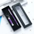 Purple ballpoint pen and mini flashlight gift set in black box for business promotion. - Deep purple