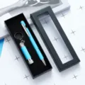 Light blue ballpoint pen and mini flashlight gift set with elegant black presentation box. - Light Blue