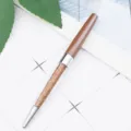 Metal crystal ballpoint pen, bronze shiny cap with clear rhinestone filled barrel variant. - Coffee