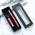 Gift set of pink touch ballpoint pen and mini flashlight in a black presentation box. - Hot Pink
