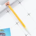 Penna a sfera in metallo con cima a cuore in oro rosa e splendida sfumatura gialla. - Sfumato Bianco Arancione