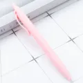 Penna a sfera retrattile rosa pastello con finitura opaca, scrittura fluida per ufficio scuola. - Rosa