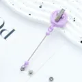 Paarse uittrekbare badgehouder met metalen clip en heldere strap voor ID-kaarten. - Draaibare Clip Stijl / Massief Snoepjespaars